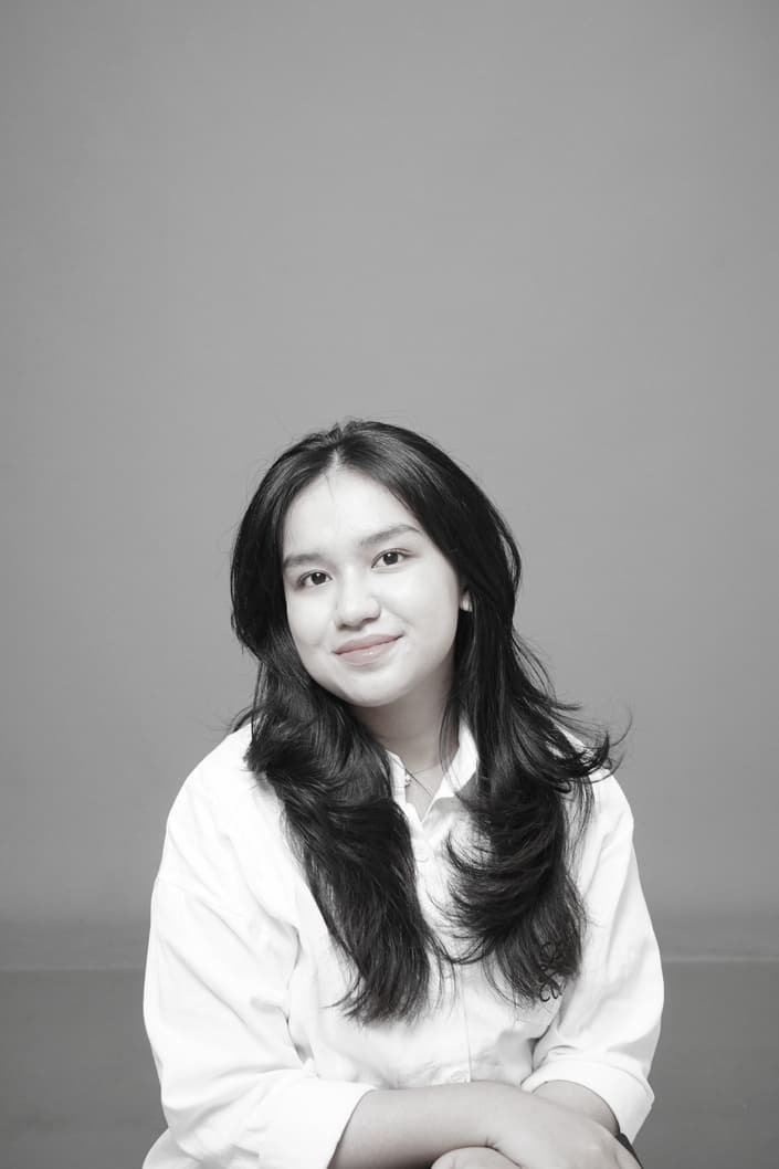 Portrait of Puti Alysha Raya, Founder & CEO of Learn 2 Love