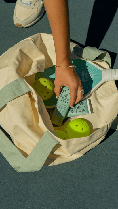 L2L Tennis Bagcharm — Learn 2 Love merchandise